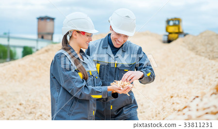 Paper mill factory workers 33811231
