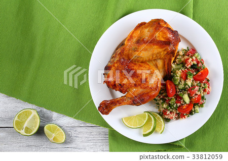half of delicious grilled juicy chicken 33812059