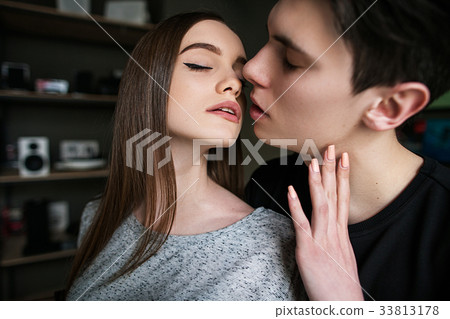 Beautiful couple kissing. Relationship background 33813178