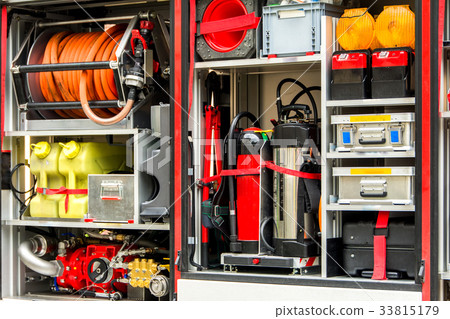 Firefighters equipment in a fire truck Firefighters equipment in a fire truck 33815179