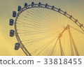 Ferris wheel in sunset time (vintage filter) 33818455