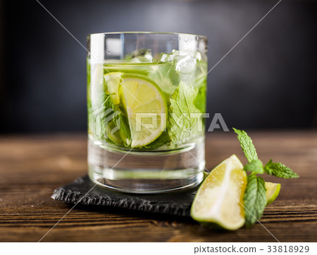 Mojito cocktail on dark background 33818929