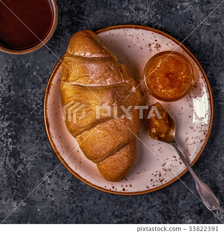 Fresh croissant on dark background. Fresh croissant on dark background. 33822391