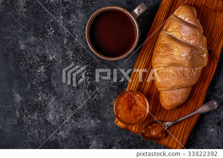 Fresh croissant on dark background. Fresh croissant on dark background. 33822392