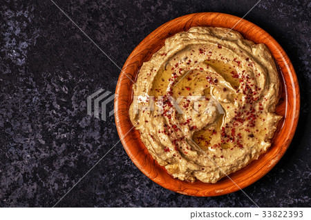 Classic hummus  on the plate. 33822393