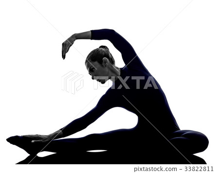 woman exercising Parivritta Janu Sirsasana woman exercising Parivritta Janu Sirsasana 33822811