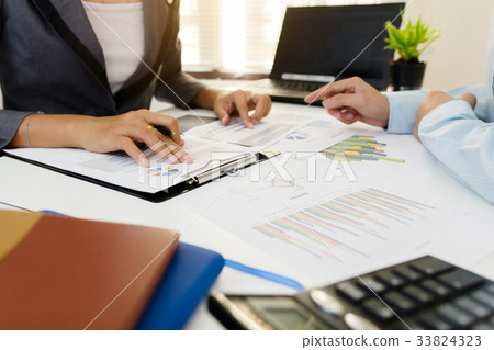 Business team meeting consulting the project Business team meeting consulting the project 33824323