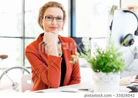 Young woman in office 33826042
