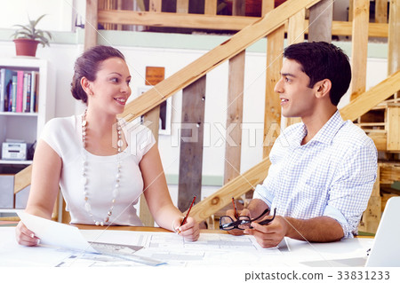 Two young architects in office 33831233