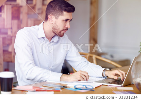 Young man in offfice 33831234