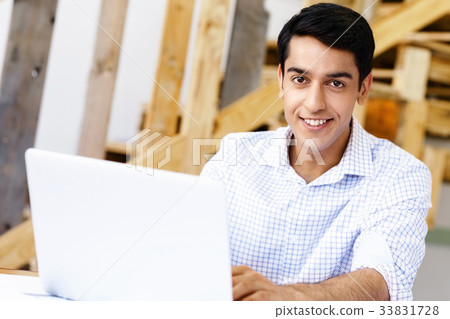 Portrait of young man in office 33831728
