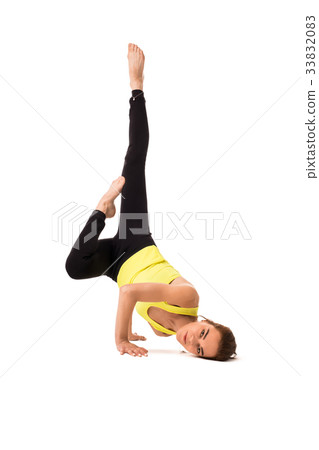 Pretty brunette practising yoga isolated shot 33832083
