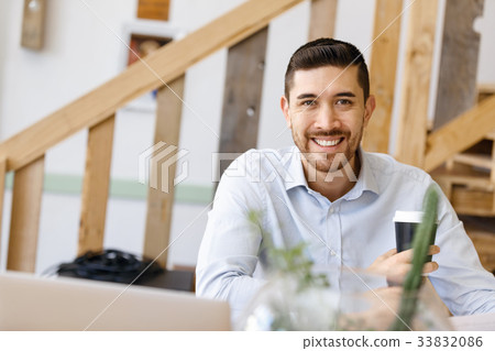 Young man in offfice 33832086