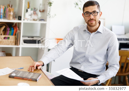 Young man in offfice 33832977