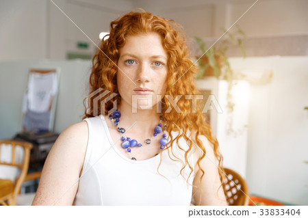 Young woman in office 33833404