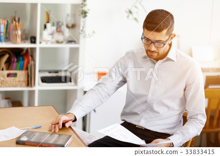 Young man in offfice Young man in offfice 33833415