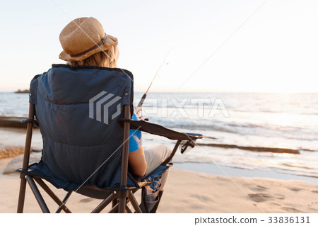 Teenage boy fishing at sea Teenage boy fishing at sea 33836131