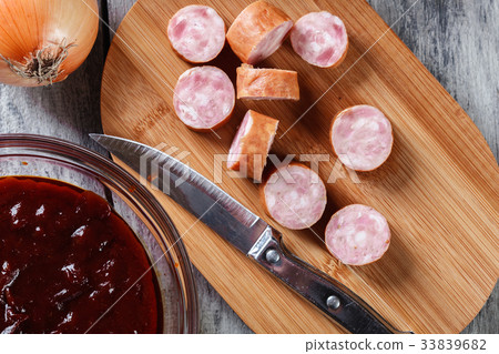 Ingredients ready for preparing German currywurst Ingredients ready for preparing German currywurst 33839682