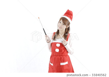 A woman in Santa costume 33840562