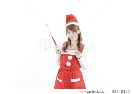 A woman in Santa costume 33840563