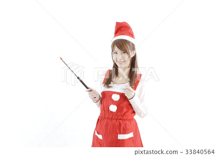 A woman in Santa costume 33840564