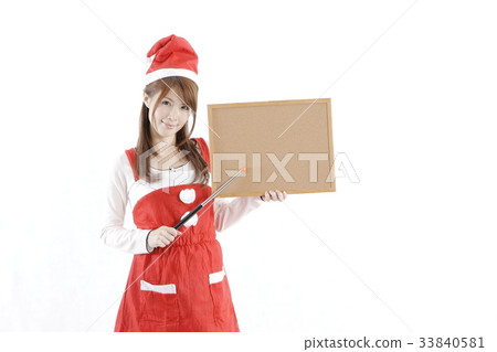 A woman in Santa costume 33840581