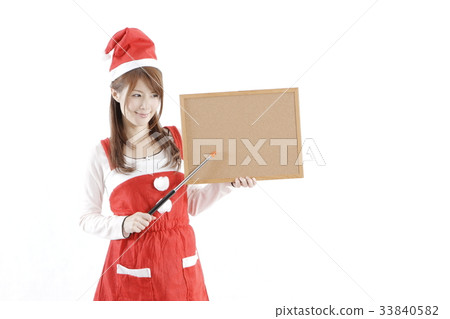 A woman in Santa costume 33840582