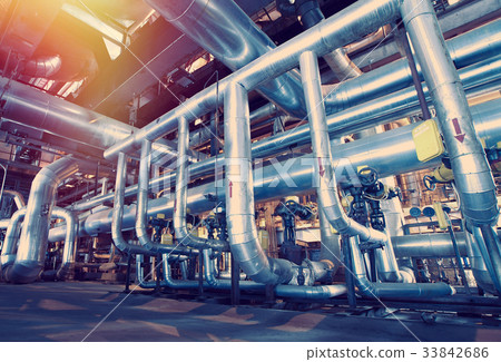 Steel pipelines and cables in blue tones Steel pipelines and cables in blue tones 33842686