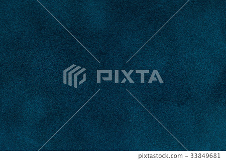 Background of dark blue suede fabric closeup.  33849681