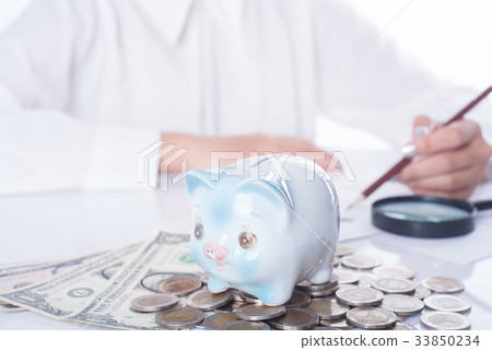 accountant or banker calculating balance. finances 33850234
