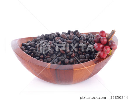 coffee beans in wood bowl on white background 33850244