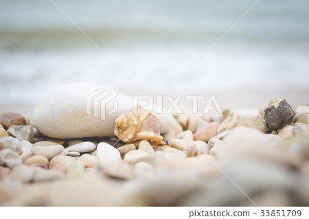 Stack of pebble stones on the beach 33851709