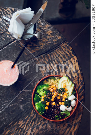 Buddha bowl vegetarian salad on wooden table 33851907