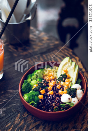 Buddha bowl vegetarian salad on wooden table 33851908