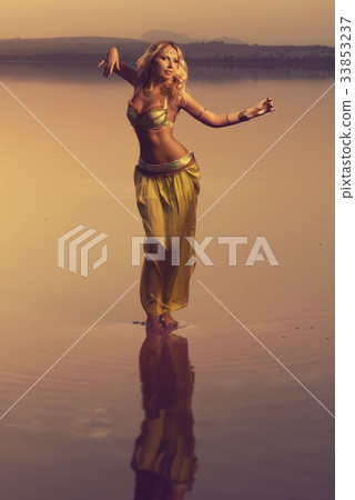 Beautiful blonde belly dancer woman 33853237