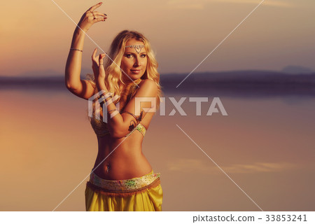 Beautiful blonde belly dancer woman 33853241