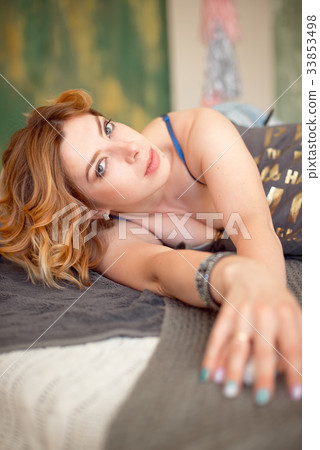 Close-up portrait of red haired beautiful woman in Close-up portrait of red haired beautiful woman in 33853498