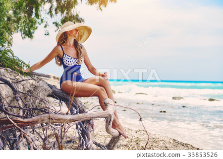 Woman on the beach 33853526