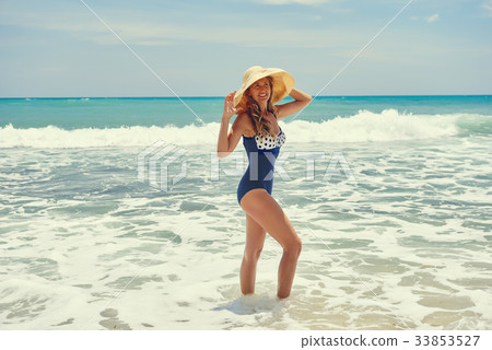 Woman on the beach Woman on the beach 33853527