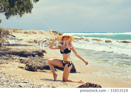 Woman on the beach 33853529