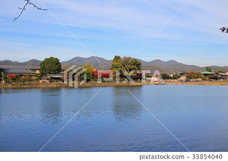 Katsura River in front of Arashiyama Mountain 33854040