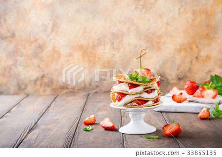 Small cake made of pancakes 33855135