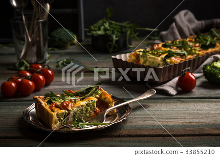 Slice of delicious homemade quiche Slice of delicious homemade quiche 33855210