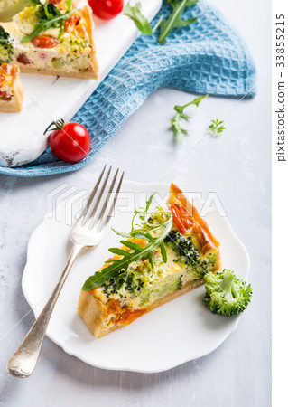 Slice of delicious homemade quiche Slice of delicious homemade quiche 33855215