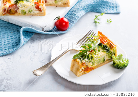 Slice of delicious homemade quiche Slice of delicious homemade quiche 33855216