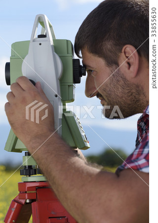 Total station Close-up Surveyor Rapeseed Total station Close-up Surveyor Rapeseed 33855630