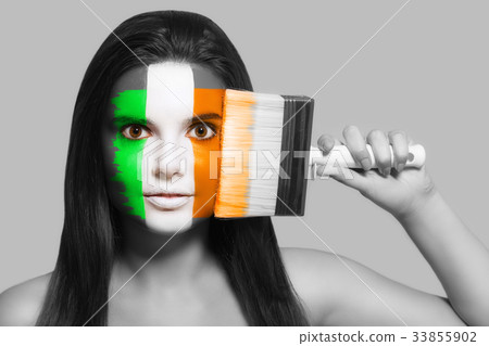 Female supporter in national colors of Ireland Female supporter in national colors of Ireland 33855902