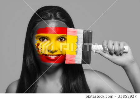 Female supporter in national colors of Spain Female supporter in national colors of Spain 33855927