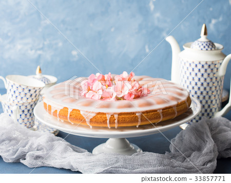 Bundt cake with frosting. Festive treat flowers 33857771