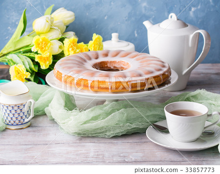Bundt cake with frosting. Easter festive dessert Bundt cake with frosting. Easter festive dessert 33857773